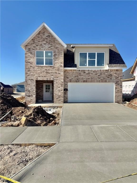 view of front of property with a garage