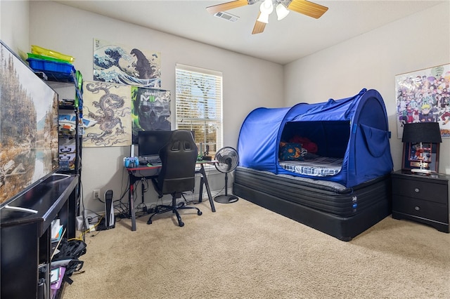 carpeted bedroom featuring ceiling fan