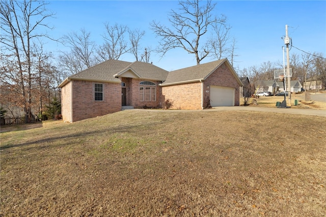 single story home with a garage and a front yard