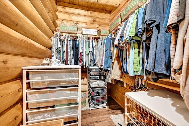 walk in closet featuring wood-type flooring