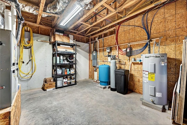 basement with electric panel and water heater