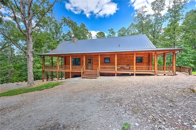 view of log cabin