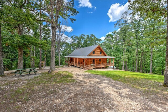 170 Meadow Ridge Rd, Eureka Springs, AR 72632 - view of front of home featuring a porch and metal roof