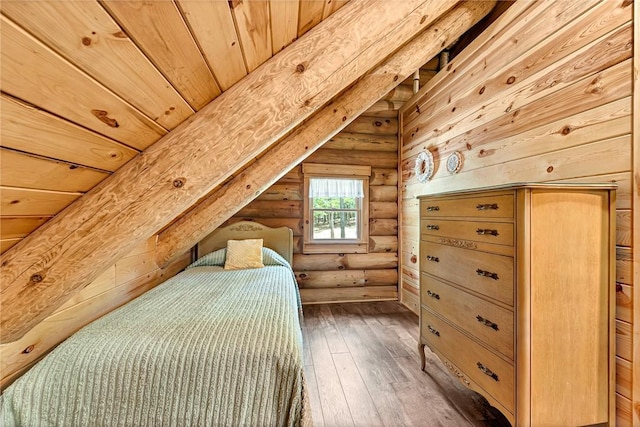 bedroom with hardwood / wood-style flooring, wood ceiling, and log walls