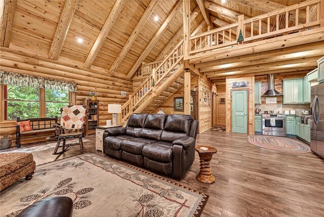 170 Meadow Ridge Rd, Eureka Springs, AR 72632 - living area featuring high vaulted ceiling, wooden ceiling with exposed beams, light wood finished floors, log walls, and stairway