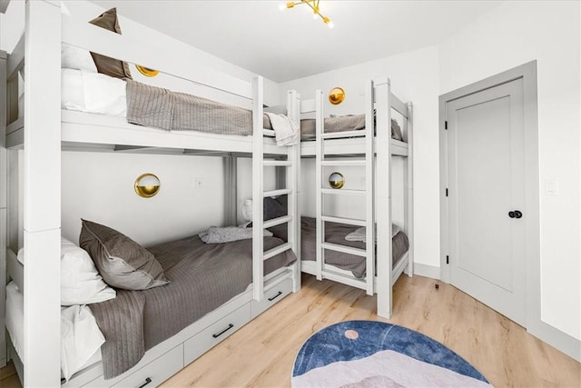 9188 Park Rd, Rogers, AR 72756 - bedroom featuring wood finished floors