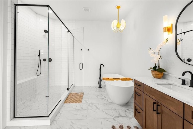 9188 Park Rd, Rogers, AR 72756 - bathroom with vanity, a soaking tub, marble finish floor, and a stall shower