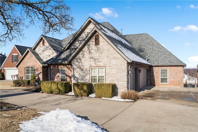 view of front of property with a garage