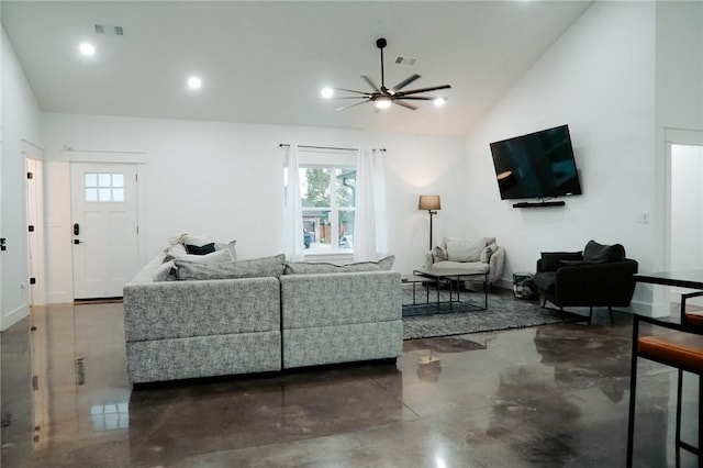 living room with ceiling fan and lofted ceiling