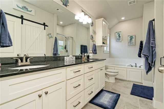 full bathroom with lofted ceiling, vanity, tile patterned flooring, toilet, and separate shower and tub