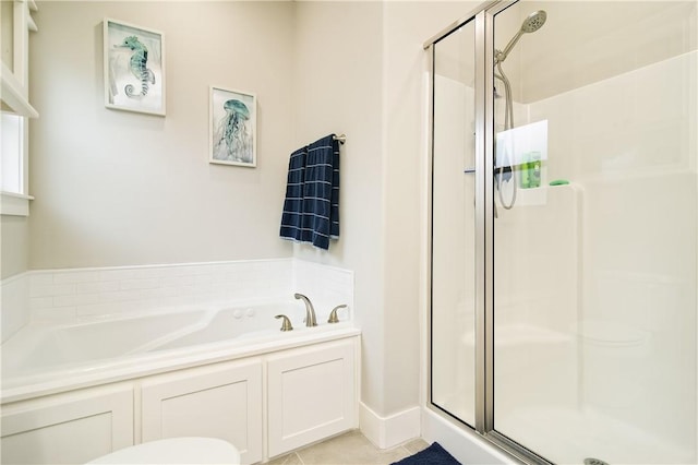 bathroom featuring shower with separate bathtub and tile patterned floors