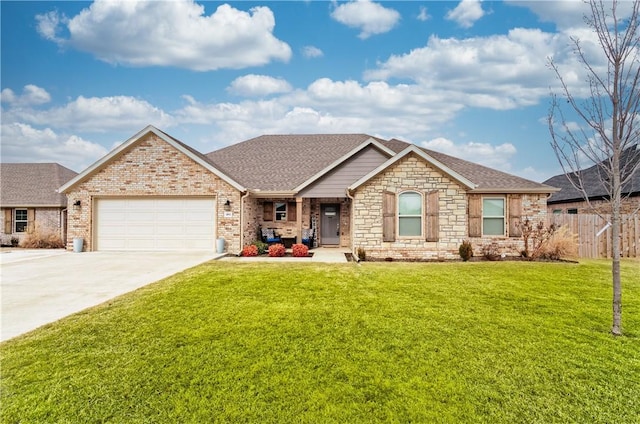 view of front of house featuring a front lawn and a garage