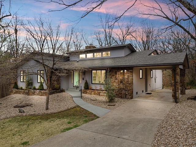 view of front of house featuring a carport