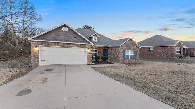 view of front of property featuring a garage