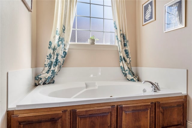 bathroom with a washtub