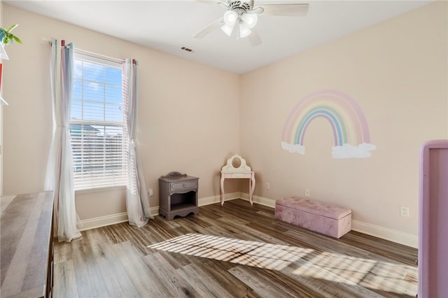 interior space featuring hardwood / wood-style flooring and ceiling fan