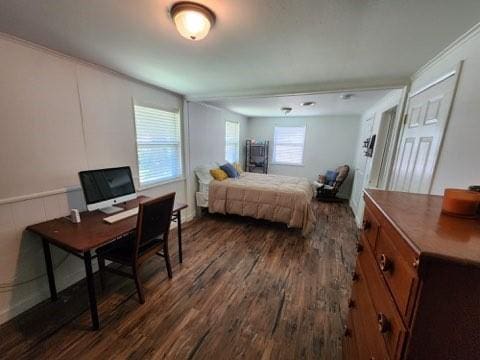 bedroom featuring dark hardwood / wood-style floors