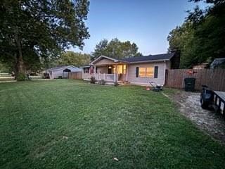 view of front of property with a front lawn