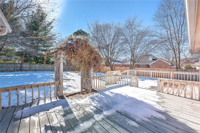 view of snow covered deck