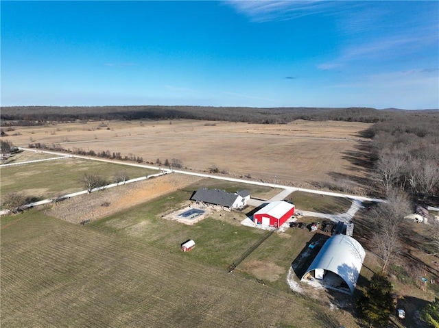 birds eye view of property with a rural view