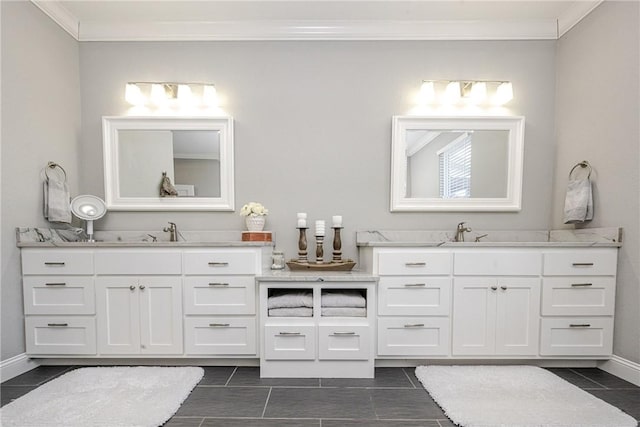 bathroom with ornamental molding, vanity, and tile patterned flooring