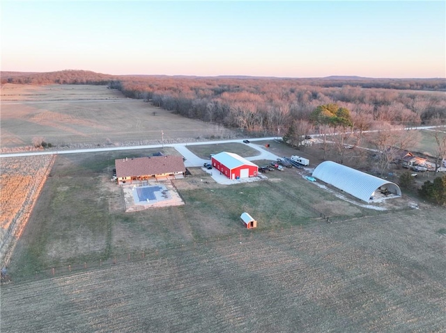 aerial view at dusk with a rural view