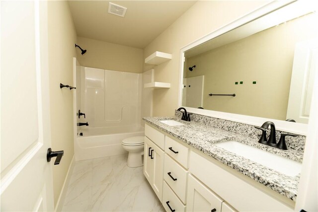 full bathroom with vanity,  shower combination, and toilet