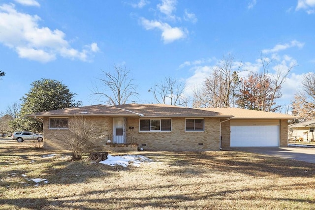 single story home featuring a garage and a front lawn