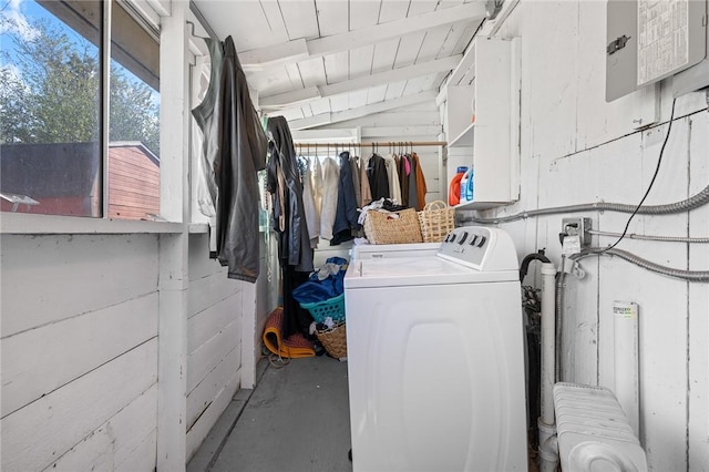 laundry room with wood ceiling and washer and clothes dryer