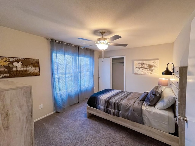 bedroom with a closet, ceiling fan, and carpet