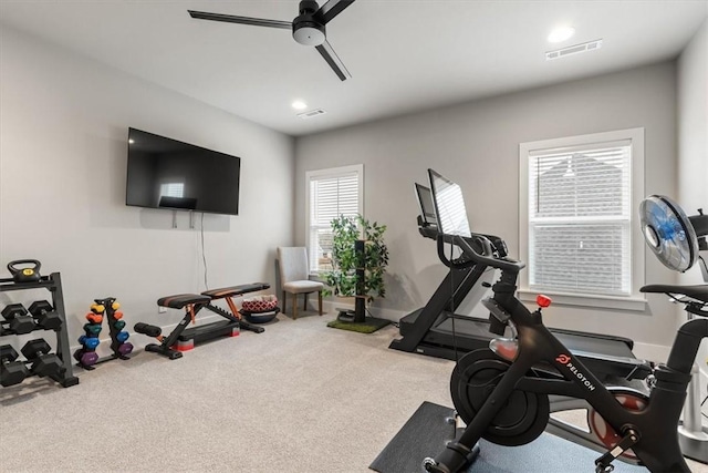 workout area featuring carpet floors and ceiling fan