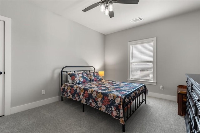 bedroom featuring ceiling fan and light colored carpet