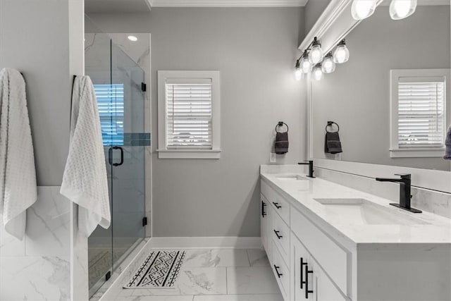 bathroom featuring a wealth of natural light, an enclosed shower, vanity, and ornamental molding