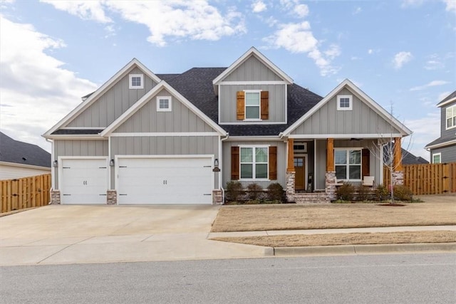 craftsman house with a garage and a porch