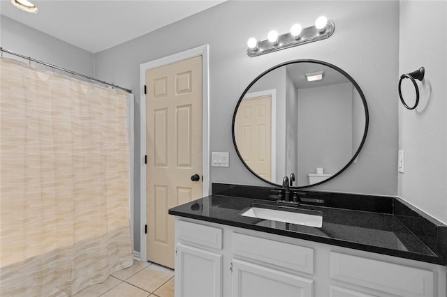 bathroom with vanity and tile patterned floors