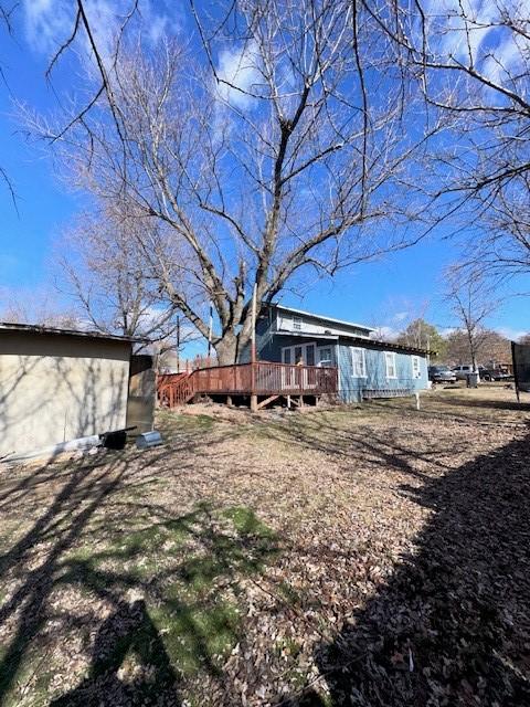 view of yard with a deck