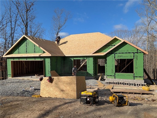 unfinished property featuring a garage