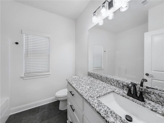 full bathroom featuring vanity, toilet, and plus walk in shower