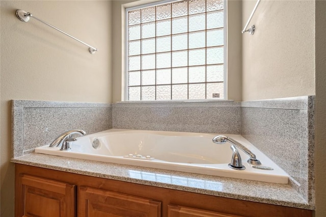 bathroom with a tub to relax in