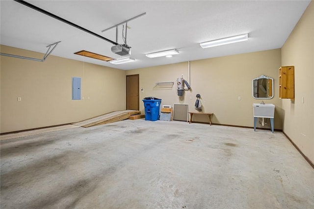 garage featuring a garage door opener and electric panel