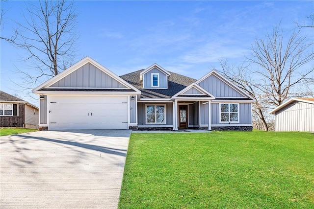 view of front of home featuring a shingled roof, a front lawn, concrete driveway, a garage, and board and batten siding