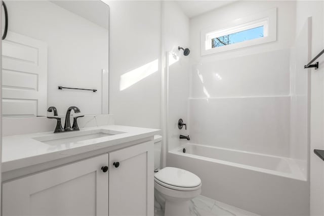 full bathroom with vanity, shower / tub combination, toilet, and marble finish floor