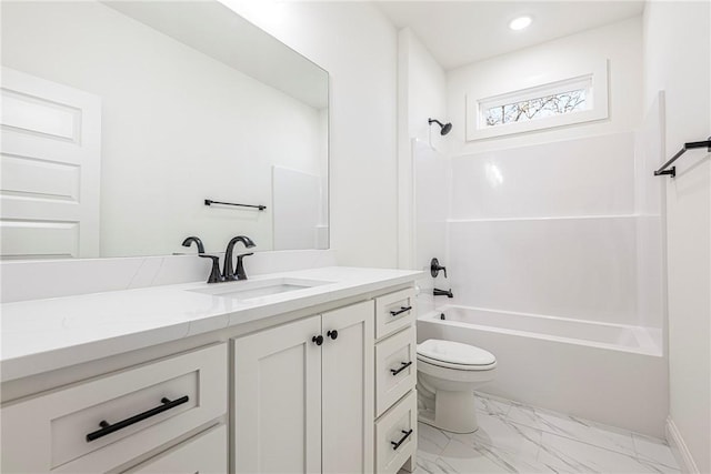 full bath featuring washtub / shower combination, toilet, recessed lighting, marble finish floor, and vanity