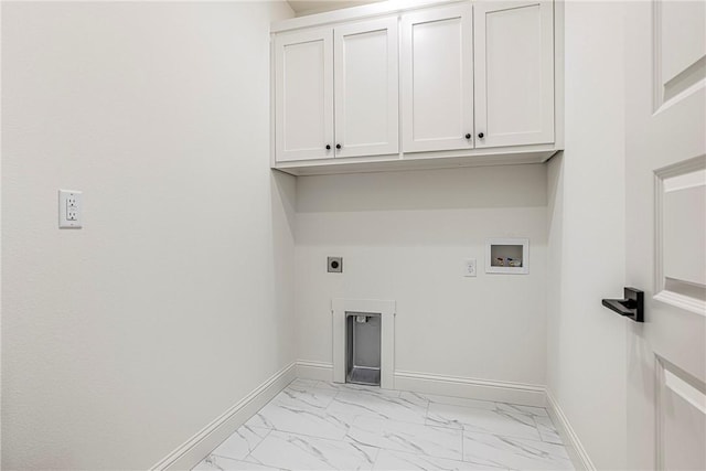 clothes washing area with electric dryer hookup, marble finish floor, cabinet space, baseboards, and hookup for a washing machine