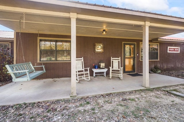 view of patio featuring a porch