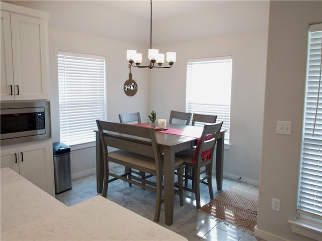 dining room featuring an inviting chandelier