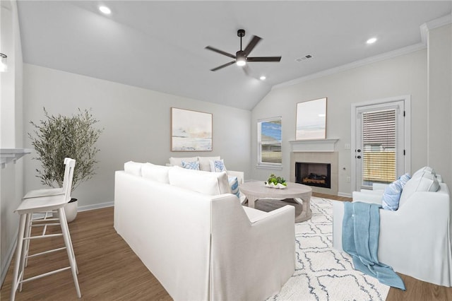 living room featuring crown molding and hardwood / wood-style floors