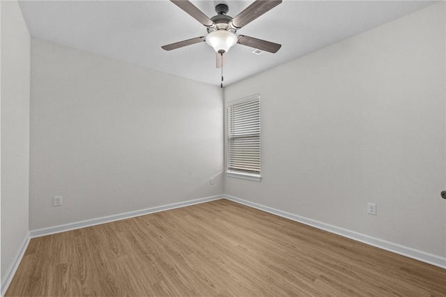 unfurnished room featuring ceiling fan and light hardwood / wood-style flooring