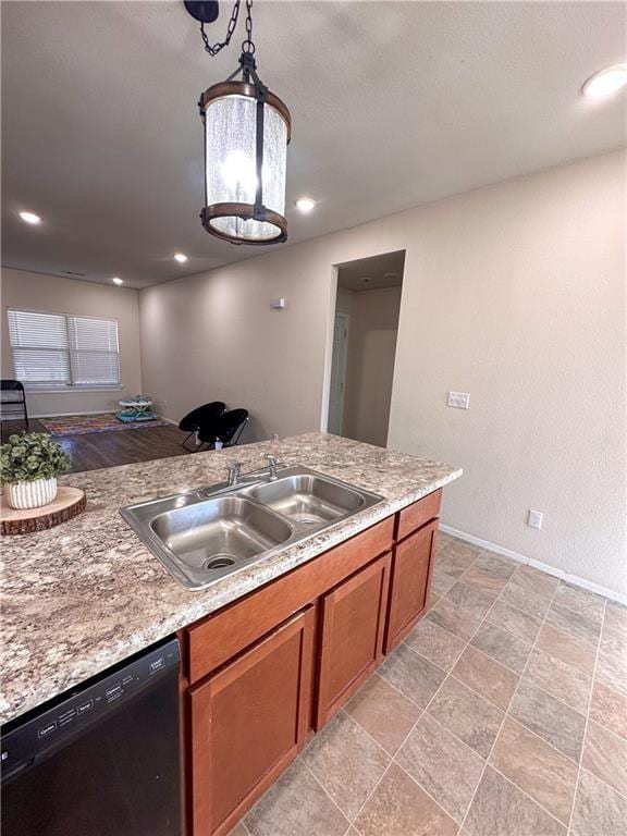 kitchen with sink, decorative light fixtures, and black dishwasher