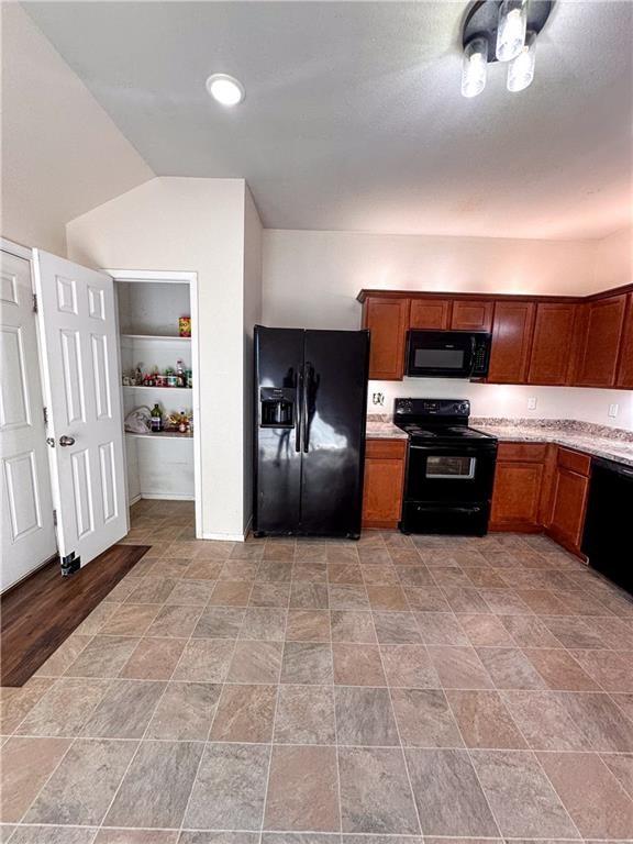 kitchen with black appliances